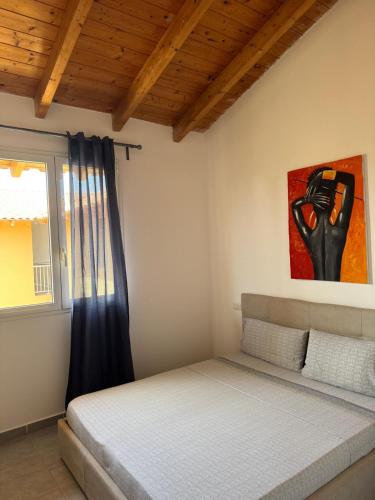 En eller flere senger på et rom på Zodiaco Apartments