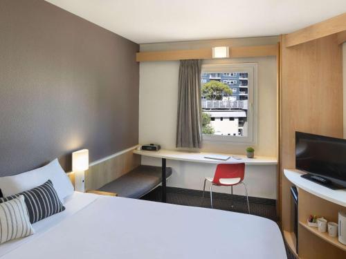 Postel nebo postele na pokoji v ubytování ibis Newcastle