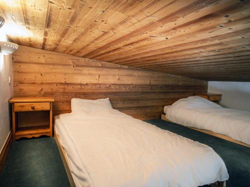 Ένα ή περισσότερα κρεβάτια σε δωμάτιο στο Superbe appartement au centre, proche pistes & commerces, 6 pers, WIFI - FR-1-519-21