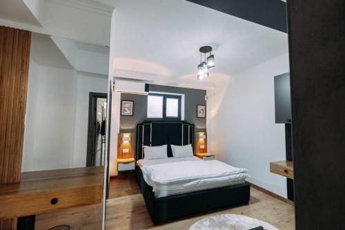 Un ou plusieurs lits dans un hébergement de l'établissement White Hotel