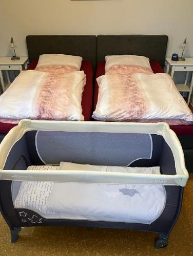 a bunk bed with two beds in a room at Ferienwohnung im Aalbachtal - Uettingen bei Würzburg in Uettingen