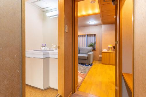 Χώρος καθιστικού στο home in kyoto guest house city walk Kyoto St ation all room with private bathroom-elevator kitchen