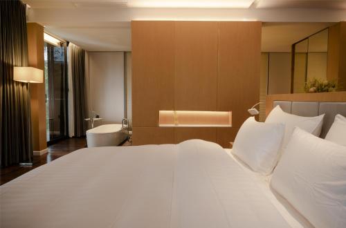 Katil atau katil-katil dalam bilik di INN HOUSE Hotel