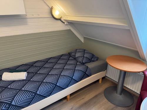 Bed & Breakfast Vlissingenにあるベッド