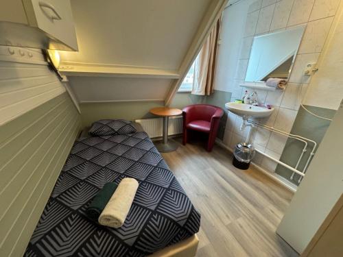 Postel nebo postele na pokoji v ubytování Bed & Breakfast Vlissingen