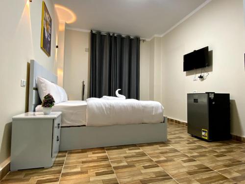 TV a/nebo společenská místnost v ubytování Sky light hotel
