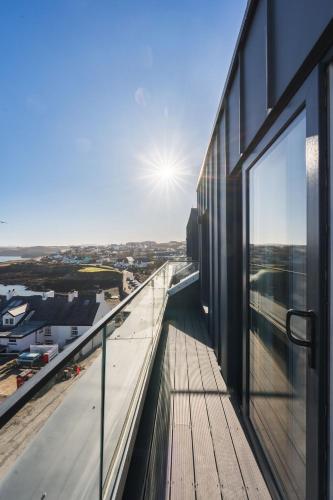 a view from the balcony of a building at Gwel Y Mor Penthouse By Birch Stays New Home in Amlwch