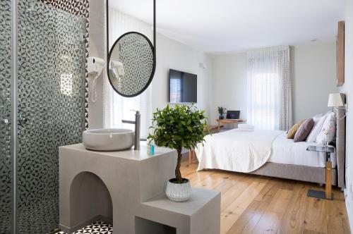 Postel nebo postele na pokoji v ubytování Margosa Boutique Hotel Tel-Aviv Jaffa