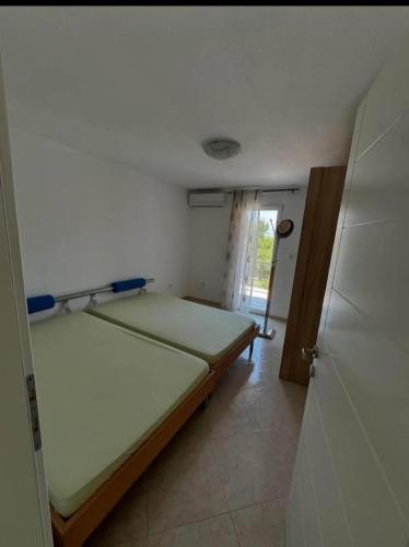 Postel nebo postele na pokoji v ubytování huzur ve güven