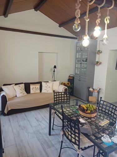 a living room with a couch and a table at Casa Amalia in Agulo