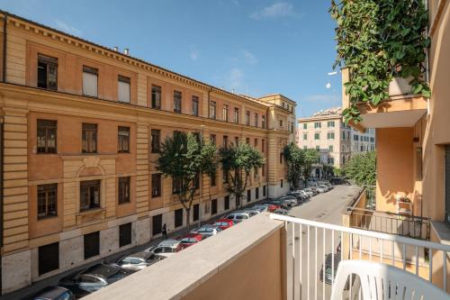 a view from a balcony of a street with buildings at Maria Magdalena Apartment Saint Peter's in Rome