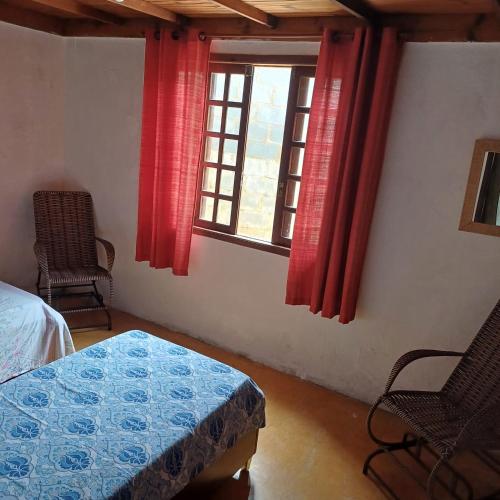 Katil atau katil-katil dalam bilik di Casa do alecrim