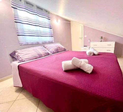 Ένα ή περισσότερα κρεβάτια σε δωμάτιο στο la Casa di Gabriella