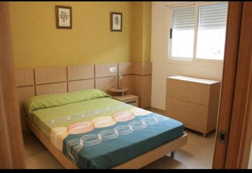Ένα ή περισσότερα κρεβάτια σε δωμάτιο στο Edificio Valparaiso,de lujo con wifi
