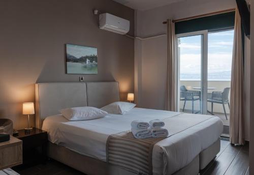 Postel nebo postele na pokoji v ubytování Plaza Hotel