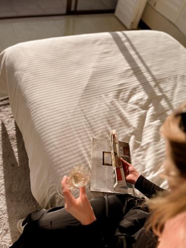 Ένα ή περισσότερα κρεβάτια σε δωμάτιο στο CasaCalme Guest House