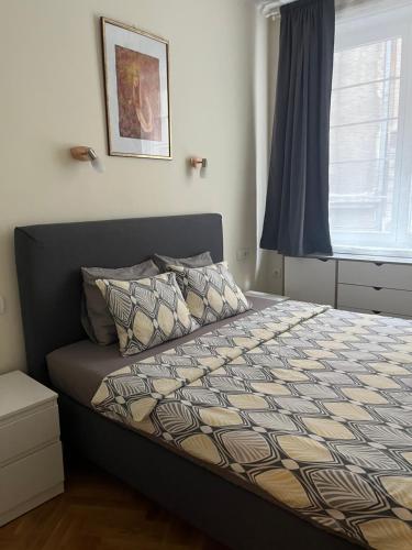 Llit o llits en una habitació de Apartment No1