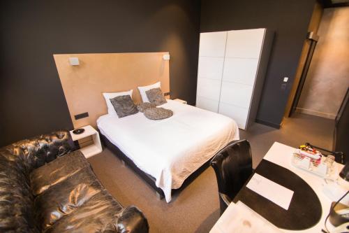 Postel nebo postele na pokoji v ubytování Hotel Moon