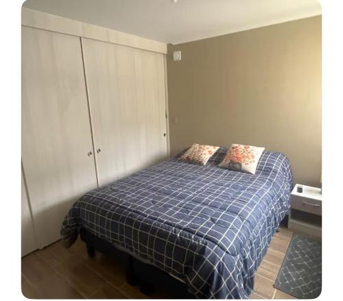 Ένα ή περισσότερα κρεβάτια σε δωμάτιο στο Apartamento en arriendo diario, Valle volcanes, Pto Montt
