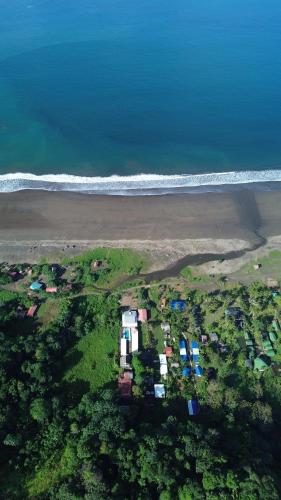 an aerial view of a beach and the ocean at Playa Lodge in El Valle