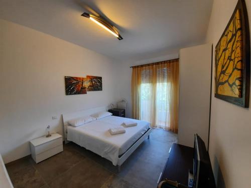 Una cama o camas en una habitación de Neviano 171
