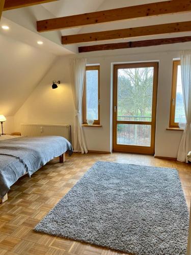 Postel nebo postele na pokoji v ubytování Hinners-Hoff Apartments