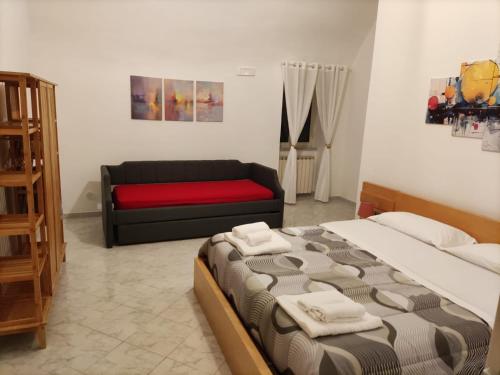 Postel nebo postele na pokoji v ubytování Il Cortile