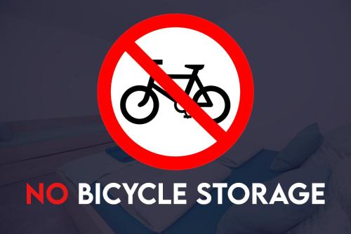 a no bicycle storage sign with a bike in it at Old Town Rooms Piran in Piran