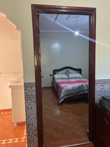 Katil atau katil-katil dalam bilik di Maison situé dans les montagnes à 15 minutes d'Agadir