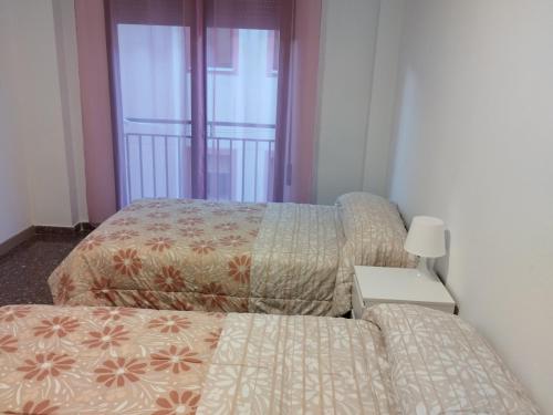 Postel nebo postele na pokoji v ubytování Apartamento San Andres