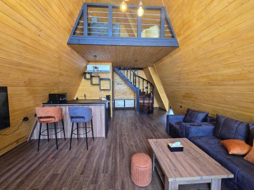 a living room with a couch and a table at Chopan Resort Aparan in Aparan