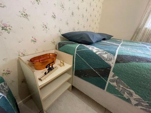 Letto o letti in una camera di O casarão rota da praia