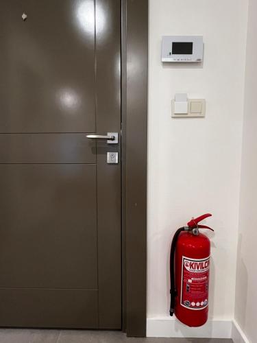 a fire hydrant is sitting next to a door at Su apartment side terrace no 3 in Side