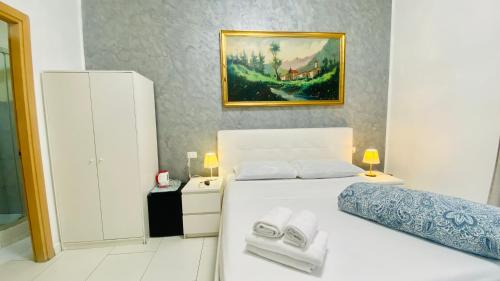 Postel nebo postele na pokoji v ubytování I Dormienti