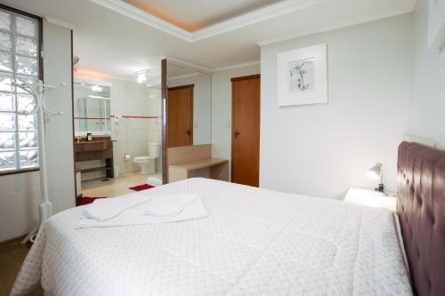 Katil atau katil-katil dalam bilik di Hotel Prata Villaggio