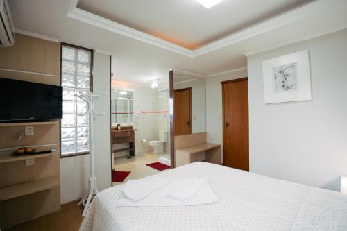 Katil atau katil-katil dalam bilik di Hotel Prata Villaggio