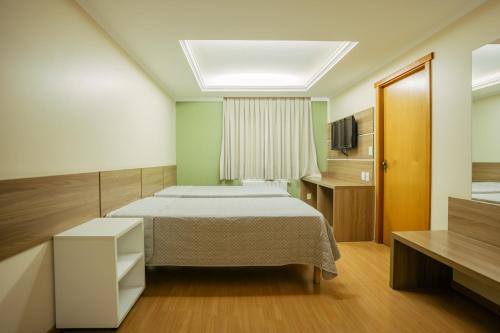 Katil atau katil-katil dalam bilik di Hotel Prata Villaggio