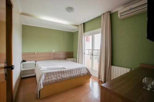 Katil atau katil-katil dalam bilik di Hotel Prata Villaggio