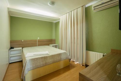 Katil atau katil-katil dalam bilik di Hotel Prata Villaggio