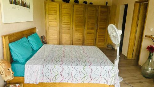 Postel nebo postele na pokoji v ubytování Chez MHD