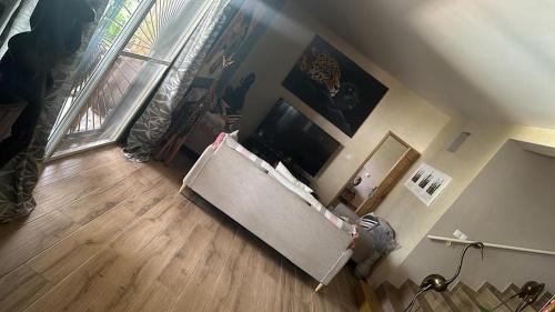 TV a/nebo společenská místnost v ubytování Chez MHD