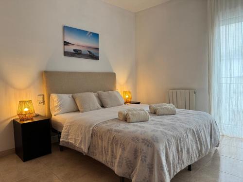 Ένα ή περισσότερα κρεβάτια σε δωμάτιο στο Casa Miravent