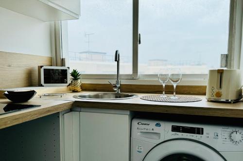 Η κουζίνα ή μικρή κουζίνα στο Cosy flat with view
