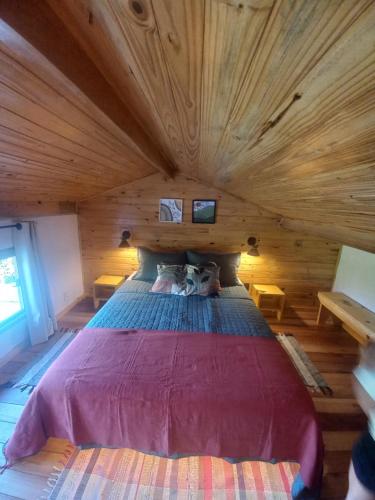 Postel nebo postele na pokoji v ubytování Chalé manancial em Visconde de Mauá