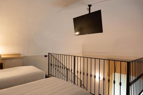 Katil atau katil-katil dalam bilik di Hotel London