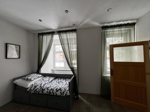 Postel nebo postele na pokoji v ubytování Apartmán Hájovna