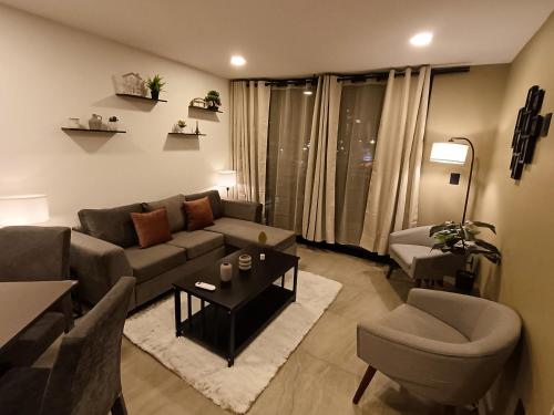 Posezení v ubytování Basento Deluxe Apartment with parking pool gym padel