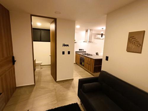 Kuchyň nebo kuchyňský kout v ubytování Basento Deluxe Apartment with parking pool gym padel