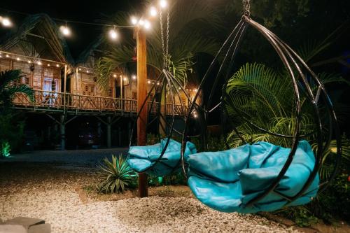 Un jardín fuera de Hostal Grand Park Palomino