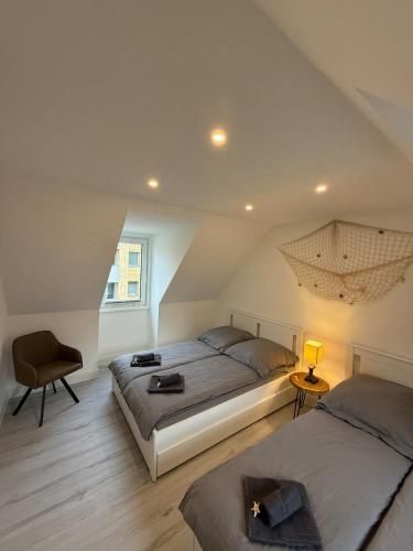 Postel nebo postele na pokoji v ubytování Loft Residence St Pauli, Harbour & Schanze